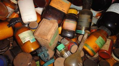 Old medicine bottles in a pile